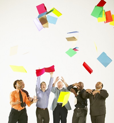People tossing documents